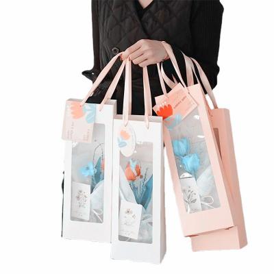 China Recycled Materials Customized Luxury Window PVC Flower Bag Gift Transparent Paper Simple Paper Bag for sale