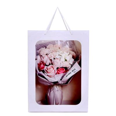 China Recycled Materials Custom High-Finished Flower Kraft Paper Gift Bag For Valentine's Day Shopping Bags With Window for sale