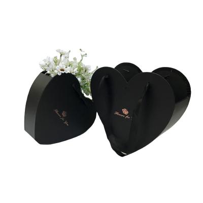 China Recyclable Plant Heart Shape Flower Box Handle Floral Display Custom Packaging Gift Boxes With Handle for sale