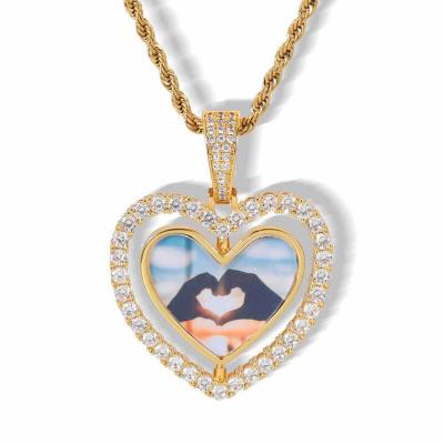 China Hiphop 2021 Environmentally Friendly Iced Out Heart Gold Rotating Photo Crystal Pendants Necklace Custom Made for sale