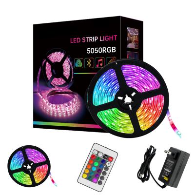 China Hotel 12V 5 Keys IR 60LEDs/Meter RGB LED 24 Meters Remote Control Flexible Strip Kit Light For Home Decoration for sale