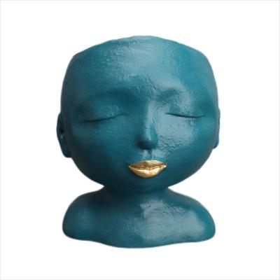 China Resin Minimalist Abstract Blue Vase Decorative Human Face Flower Vase Custom Color For Home Decor for sale