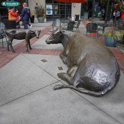 China America Tall Outdoor Sculpture A Bull Statue Lying On The Ground Brass Bronze Bull Sculpture for sale