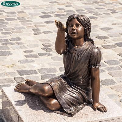 China China In The Park Child Life Size Girl Sitting And Playing Bronze Statue for sale