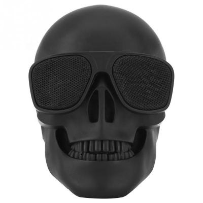 China Wireless Charger for Mobile Phone Portable Mini Skull Skeleton Speakers Creative Wireless Speaker for Halloween Party Travel Outdoor Home Decor for sale