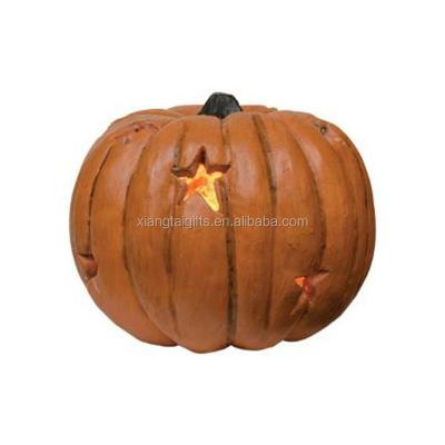 China Pumpkin For Halloween Medium Lit Resin Pumpkin With Star Cutouts For Halloween Decor for sale