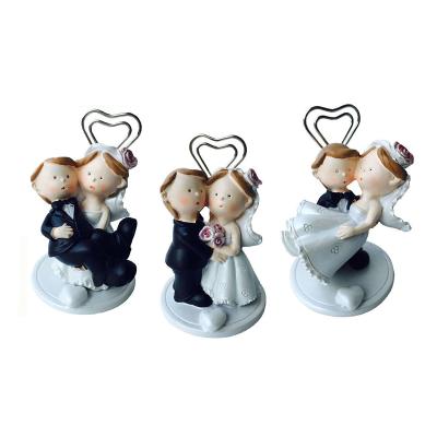 China Wedding Photo Clip for Wedding Bride and Groom Place Card Holders Resin Wedding Photo Clips for sale