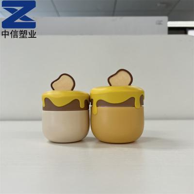 China Cosmetic cute plastic honey jar shape face cream jar pp 30g/50g jar baby cream jar for sale