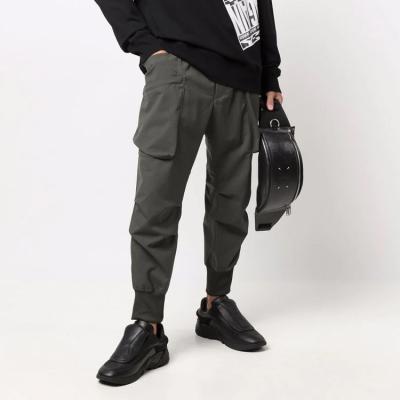 China Custom Anti-Wrinkle Cargo Pants Mens Casual Cotton Canvas Loose Fit Elastic Waist Olive Track Cargo Pants for sale