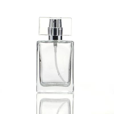 China Wholesale Cosmetic 35ml Spray Cosmetic Square Glass Perfume Bottle With Atomizer PS Cap for sale