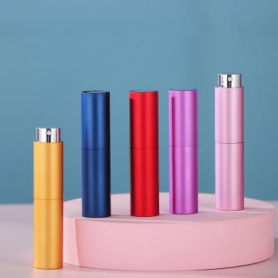 China 8ml Cosmetic Shell Rotary Telescopic Spray Aluminum Twist Up Perfume Atomizer Bottle For Perfume Spray Packaging for sale