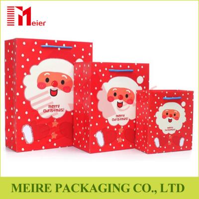 China Xmas Santa Claus printing gift bag festival christmas paper bag printed with thress size for sale