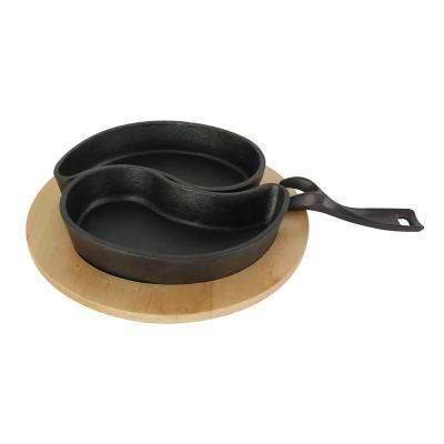 China Sustainable Double Ear Round Wood Based Cast Iron Plate Barbecue Seasoning Pot for sale