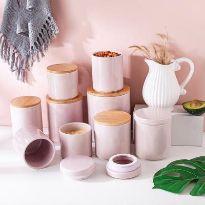 China Freshness Preservation Food Storage Canisters Simple Pink Ceramic With Bamboo Lid for sale