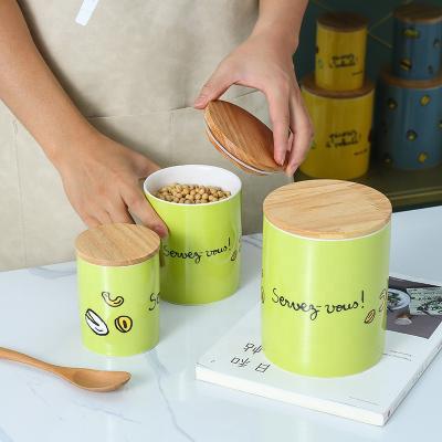 China Airtight Design Kitchenware Airtight Flower Freshness Preservation Logo Storage Jars Coffee Tea Sugar Ceramic Can for sale