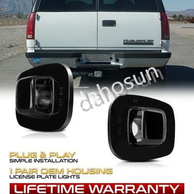 China For Chevy GMC Tahoe Yukon C1500 Suburban Black Bezel Rear Bumper Tag Light License Plate for sale