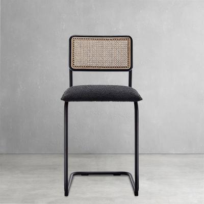 China Wholesale Home Furniture Rattan Backrest Vintage Design Buckle Cushion High Bar Convertible Counter Stool With Black Metal Base for sale