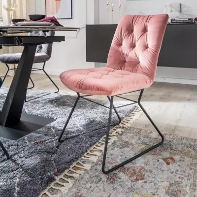 China Low MOQ Comfort Sponge Black Lacquer Pink Velvet Fabric Convertible Legs Elegant Dining Chair for sale