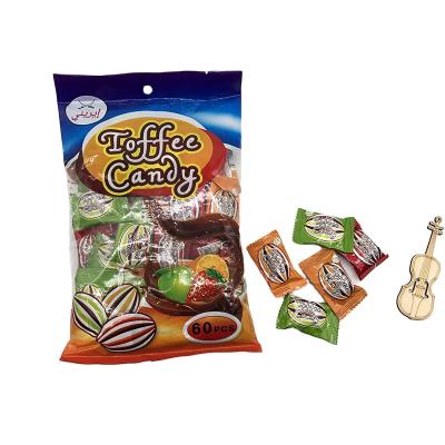 China Natural Professional Manufacture Cheap Fruit Toffee Candy With Chocolate Jam Central Filled Chewy Candy for sale