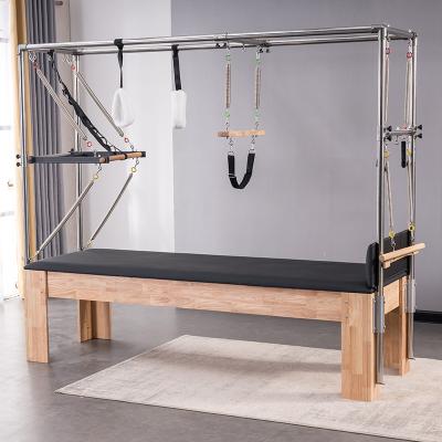 China Wood+Aluminum Alloy+PU Factory Price Gym Machine Cheap Cadillac Pilates Reformer Pilates Bed for sale