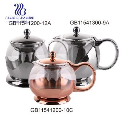 China Wholesale Viable 800ml Borosilicate Glass Heat Resistant Teapot with Infuser and Stainless Steel Handle for sale