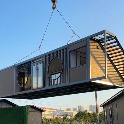 China 18mm E0 Particularizado Kitchen Prefab Modular Container Casas Com Parede 50mm Painel Sandwich à venda