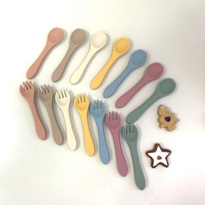 China Amazon BPA Free Popular Plastic and BPA Free Baby Weaning Step First Forming Self Feeding Baby Utensils Silicone Baby Spoon and Fork Set for sale