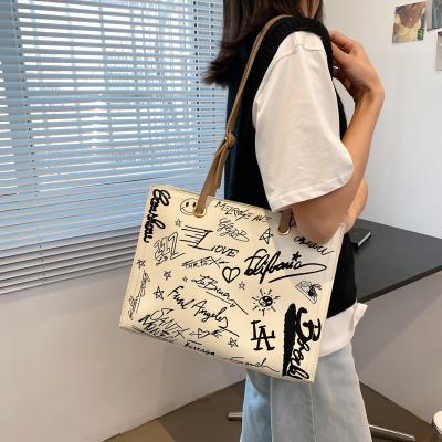 China Wholesale Large Capacity Canvas Women's Korean Style Handbag Fashion Graffiti Handbag Beach Lady Bags Shoulder Bag for sale