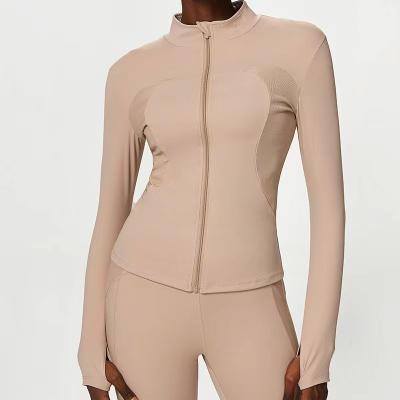 China Solid Color Rib Splice Tight Stand Neck Breathable Yoga Running Jacket Thin Yoga Wear Fitness Wear Jacket for sale