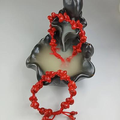 China Romantic Four Leaf Clover Shaped Pure Red Bean Acacia Bean Fashion Jewelry Bracelet Handwoven for sale