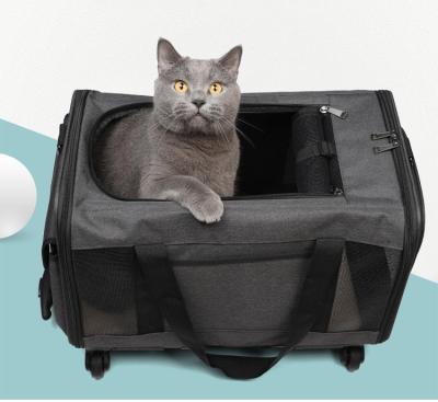 China Breathable Pet Cat Carrier Rolling Puppy Trolley Rolling Airline Approved Travel Wheels Luggage Bag for sale