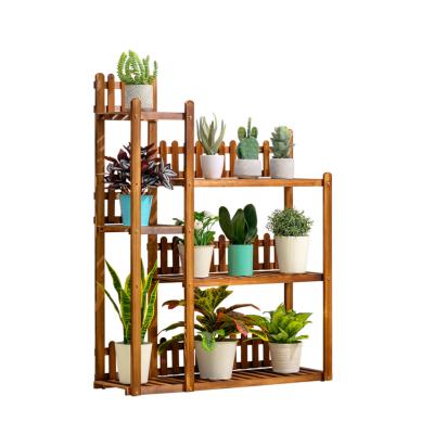 China Modern Wooden Plant Rack 4 Tiers Pine Indoor Garden Flower Plant Stand Stand With Wheels for sale