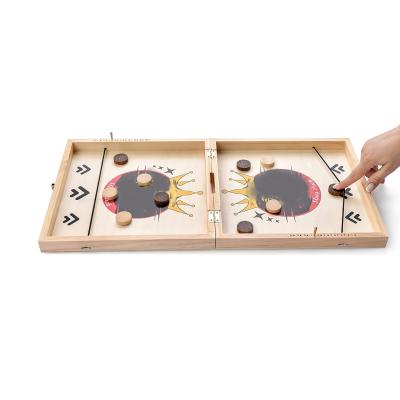 China OEM Puck Foosball Winner Board Game Wooden Slingshot Board Speed ​​Pebble Wooden Game for sale