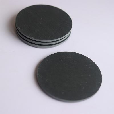 China Luxury Single Surface Viable Natural Smooth Natural Black Stone Round Coaster Cup Coaster Wholesale for sale