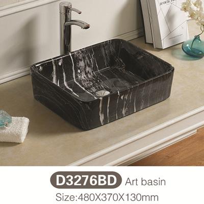 China Easy Clean Black Countertop Ceramic Sink Art Model Basin Color New for sale