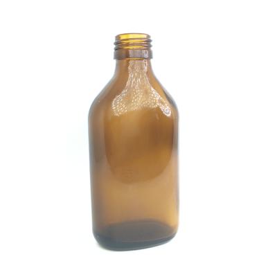 China 120ml 4oz Oval Amber Glass Beverage Bottle for sale