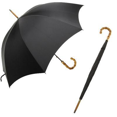 China Stretch straight umbrella made of carbon fiber rods and bamboo handle for sale