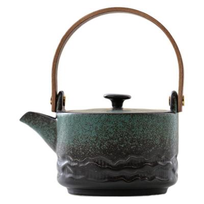 China Experience the Beauty of Handcrafted Tea with Ceramic Teapot and Lifting Beam Handle for sale