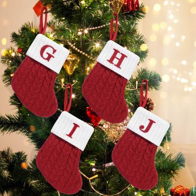 China Christmas Tree Holiday Gifts Festive Red Stockings with Snowflake Alphabet Letters Design for sale