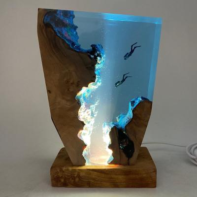 China Home Decoration Pieces Luxury LED Ocean Night Light Shark Diver Resin Table Lamp for Kids for sale