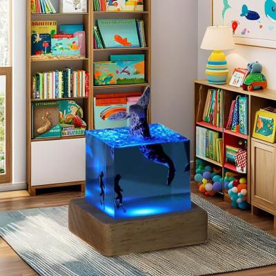 China Modern Art Style Bamboo Resin Table Light for Kids Ocean-Themed Epoxy Night Lamp for sale