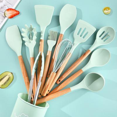 Chine Un ensemble d'outils de cuisine durable avec une spatule en silicone antiadhésif et une poignée en bois à vendre