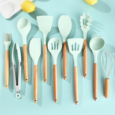 Cina In acciaio inossidabile Silicone utensili da cucina Set colore personalizzato per gli acquirenti commerciali in vendita