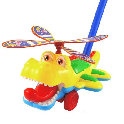 China Plastic Crocodile Children's Toys Push Hand Stroller Baby Toddler Baby Single Stick Tongue Glow Beach Walker With Wheels For Kids for sale