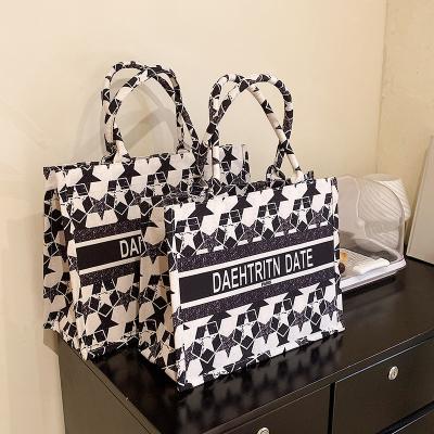 China PORTABLE Hot Selling Large Capacity Shopping Tote Ladies Hand Bags Designer Luxury Shopping Bag with Low Price for sale