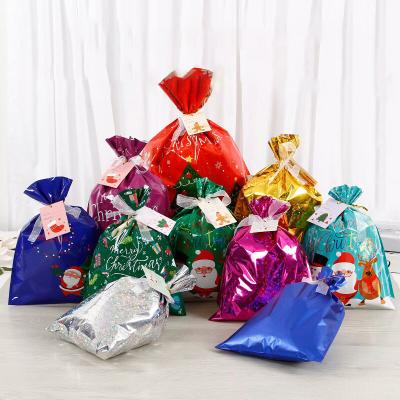 China Christmas Cookies / Party Candy Gift Wrapping Drop Shipping Premium Christmas Decoration Plastic Waterproof String Candy Bags Christmas Drawstring Gift Bags for sale