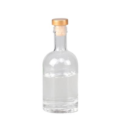 China Beverage 700 / 750 Ml Round Shape Glass Bottles Decal / Blank Spray Coating / Hot Stamping Bottle Glass for sale