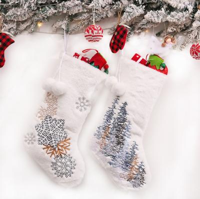 China Christamas New Home Decoration Christmas Decorations Embroidered White Snowflake Christmas Tree Plush Christmas Stocking Gift Bag Candy Bag for sale