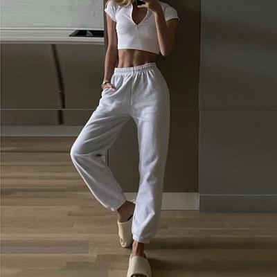 China Anti-Wrinkle Women Casual Loose Elastic Waist Sports Pants Solid Color Sweatpants Loose Ankle-Length Pants for sale