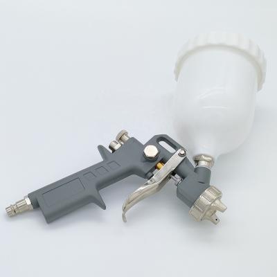 China Gravity hand held  High Pressure S990 - UP  Gravity feed HVLP pneumatic air spray gun for sale